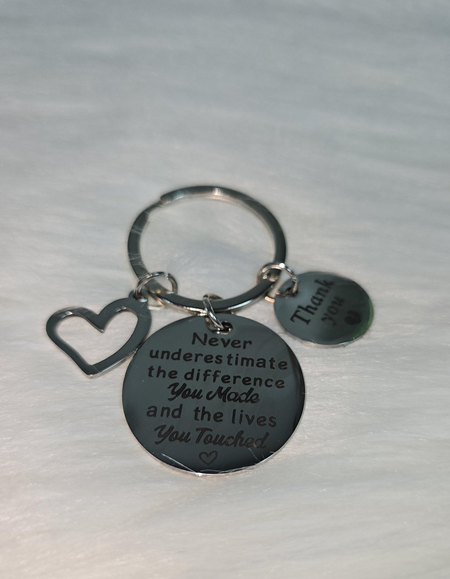 (Copy) "Never underestimate the difference you've made." Keychain