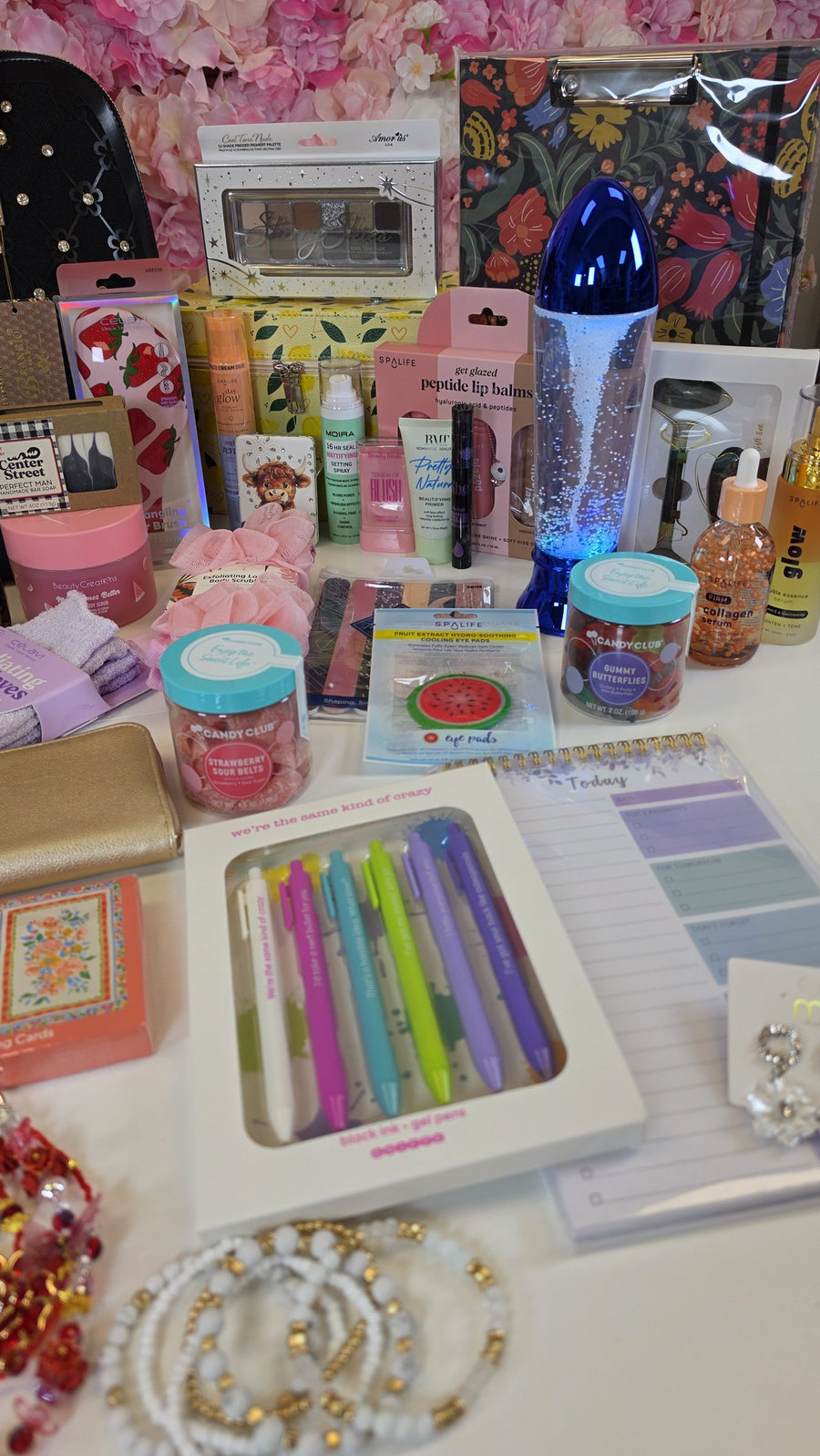 Glitter lamp, gel pens, planner pad and Candy Club candy
