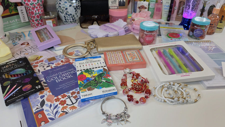 Coloring book, markers, colored pencils, playing cards and bracelets